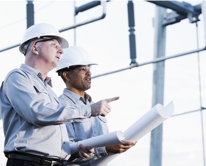 Two men in hard hats Two men in hard hats